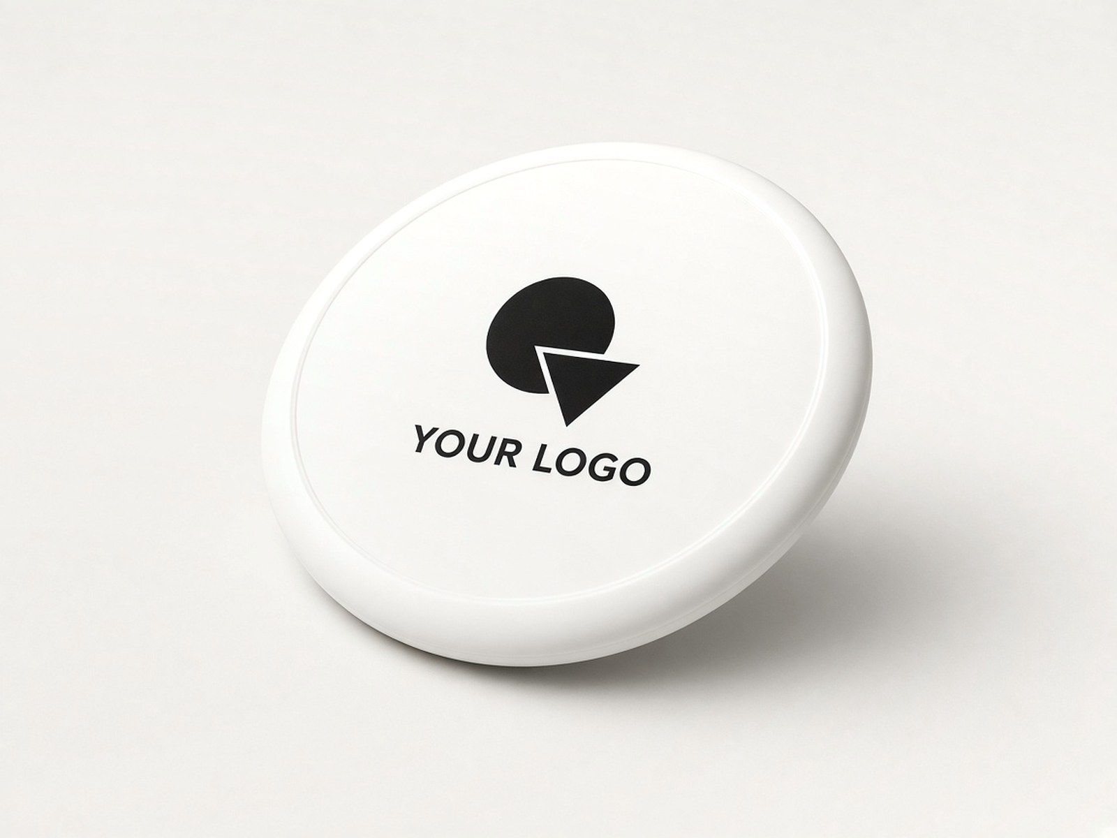 A white flying disc printed in black with an example logo.