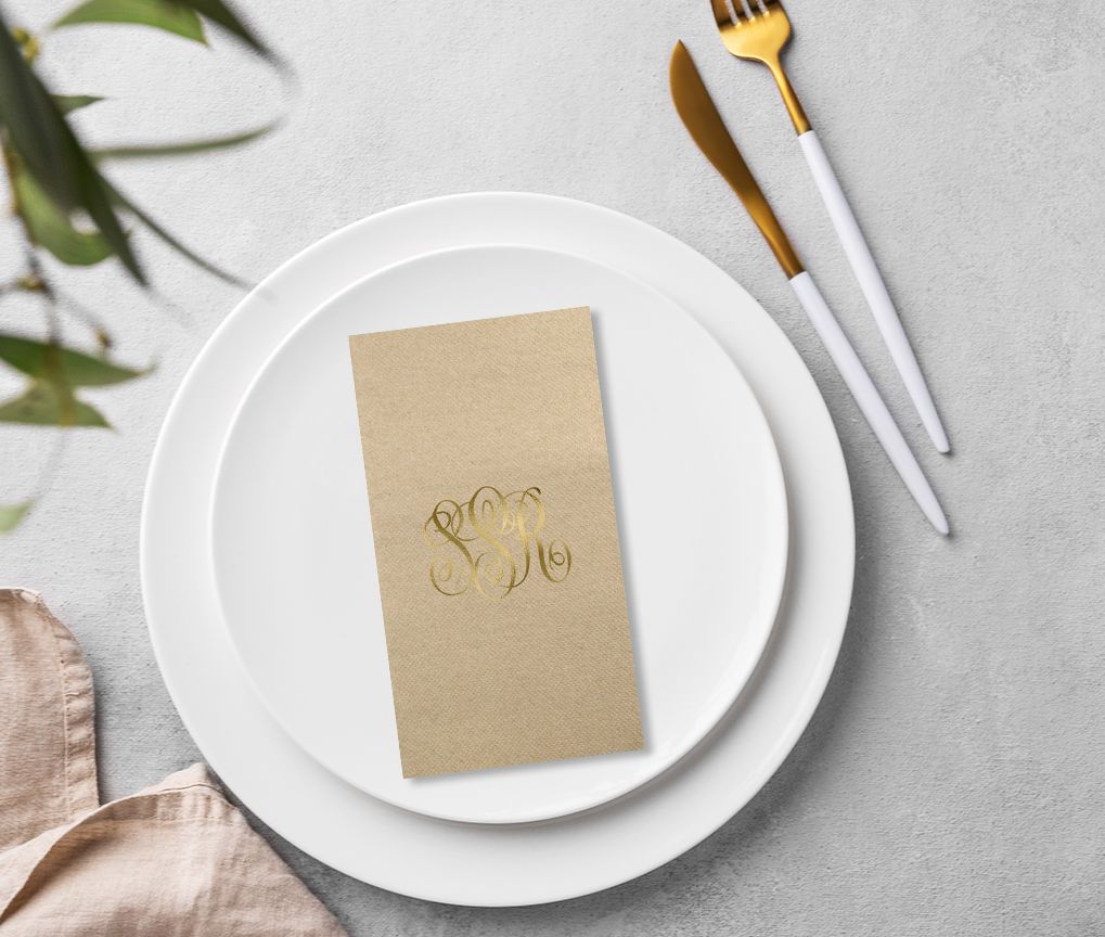Eco Natural 1/8 Fold Dinner Towels foil stamped, shown in use