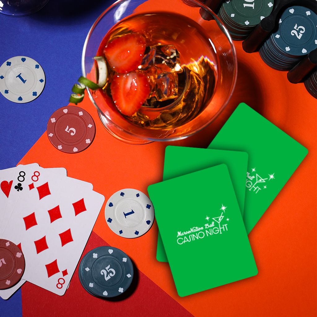 Solids Playing Cards printed in ink, shown in use at a party